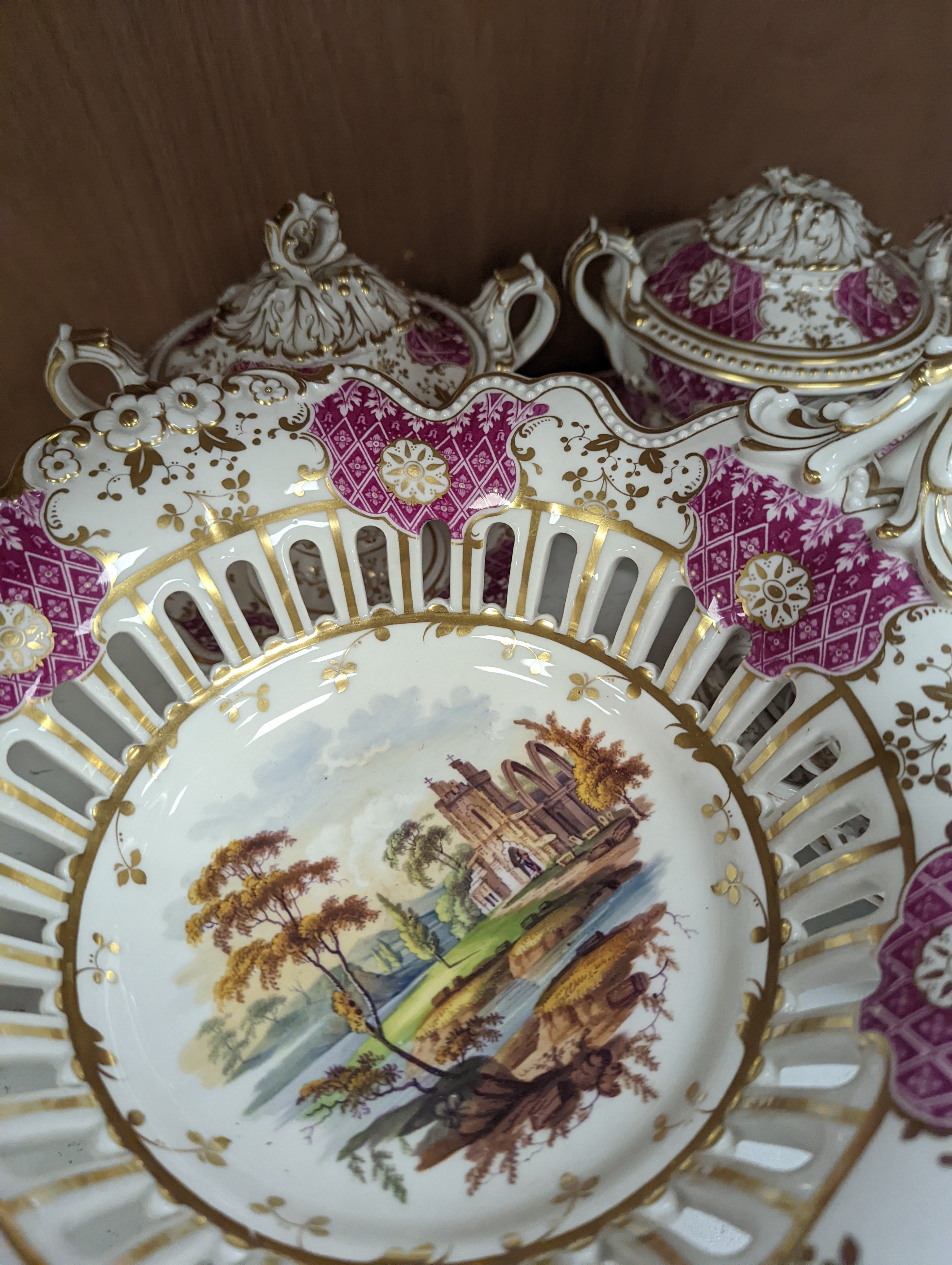 A Ridgways porcelain topographical part dessert service, c.1835, pattern number 2168, the sauce tureens and covers pattern number 2179